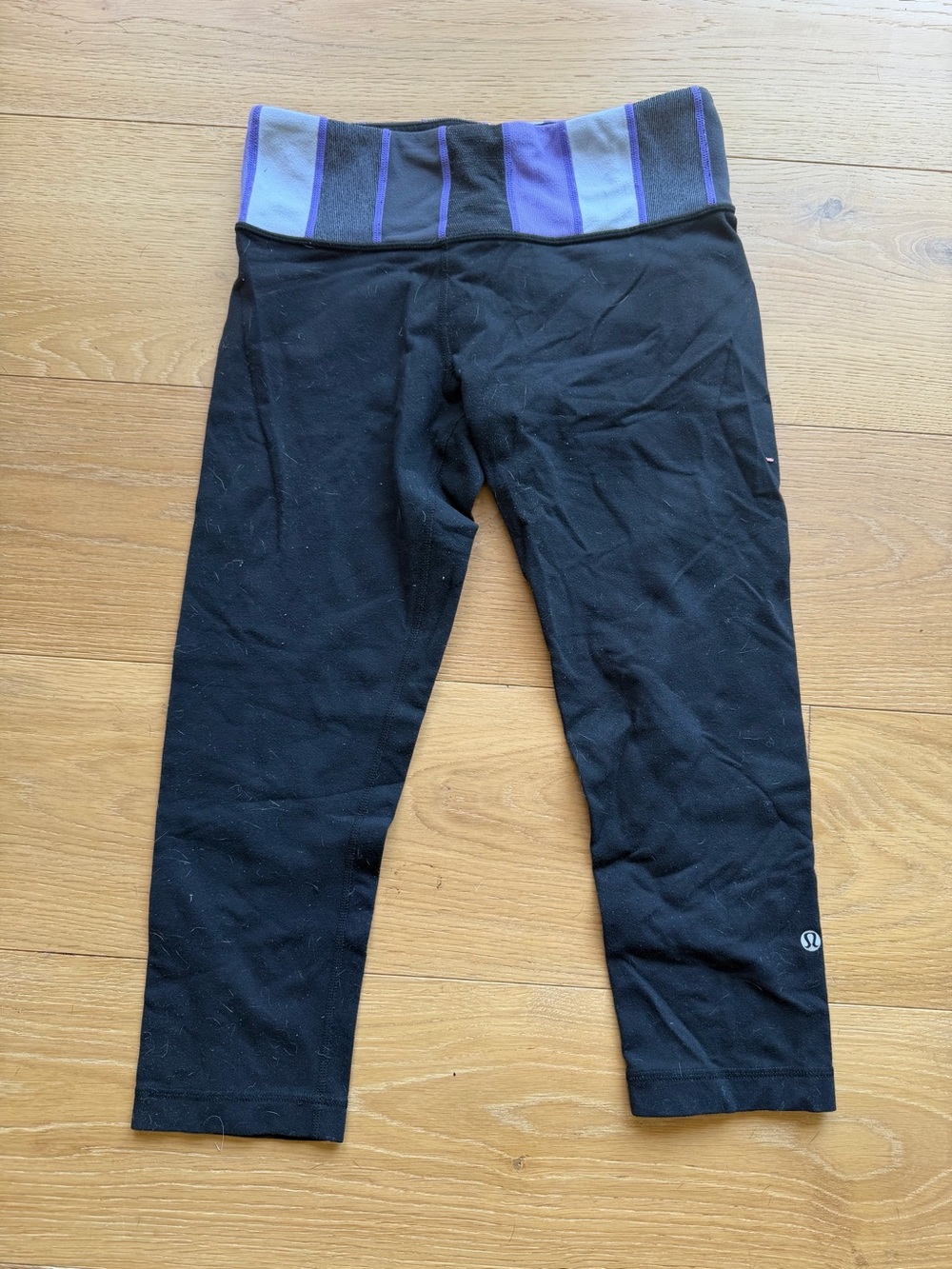 lululemon athletica women’s Black Cropped Leggings with Purple Striped Waistband